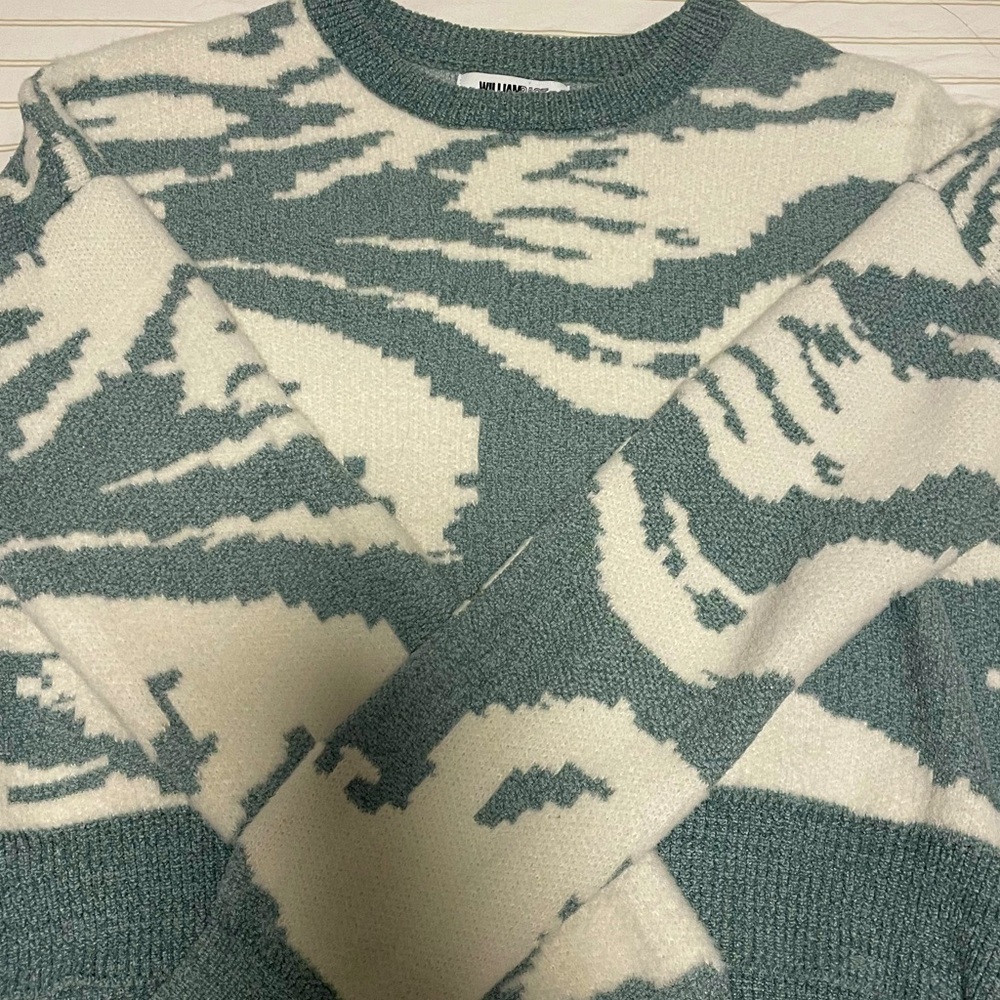 soft cozy stripped sage green and off white sweater